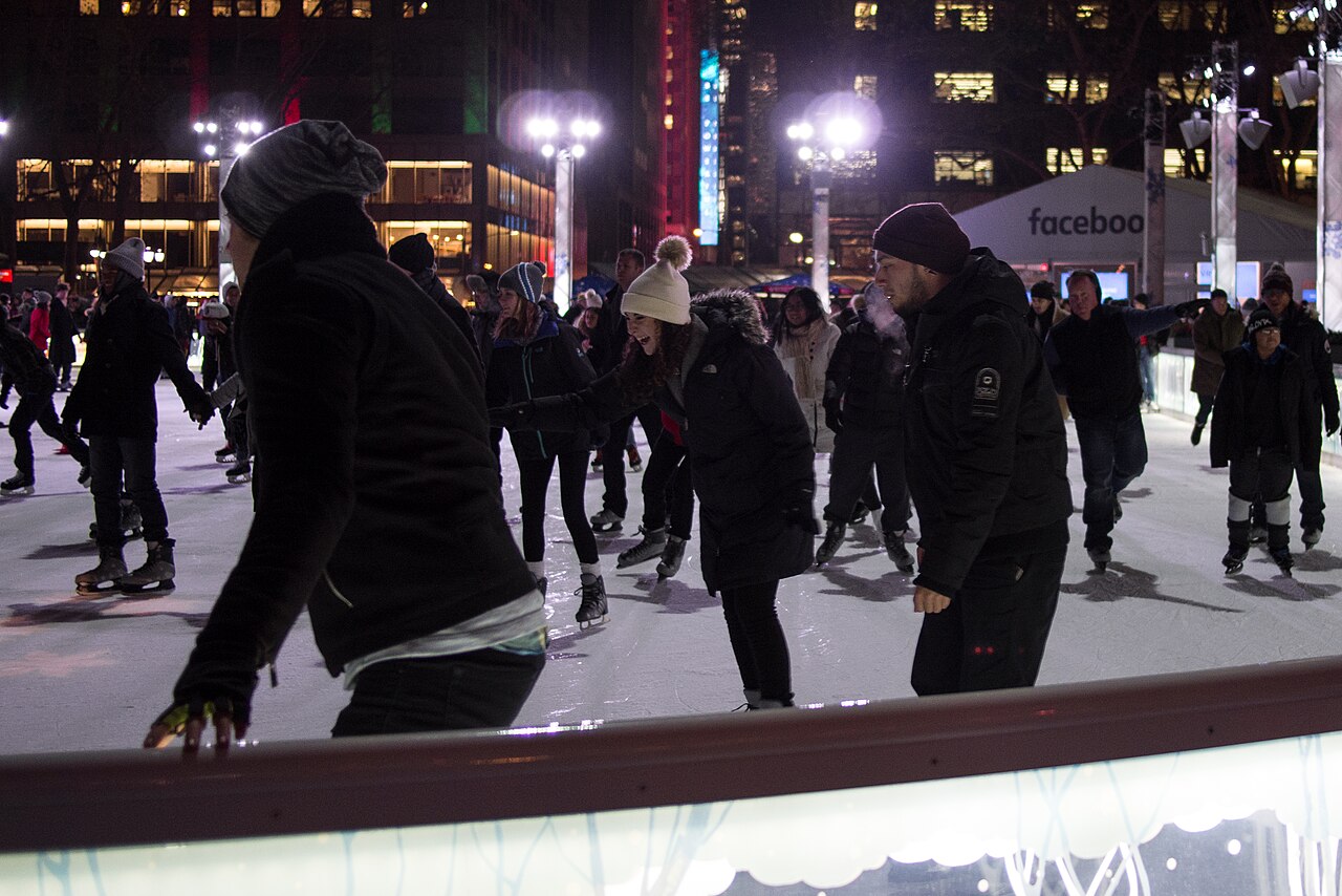 Friends enjoying an evening of ice skating